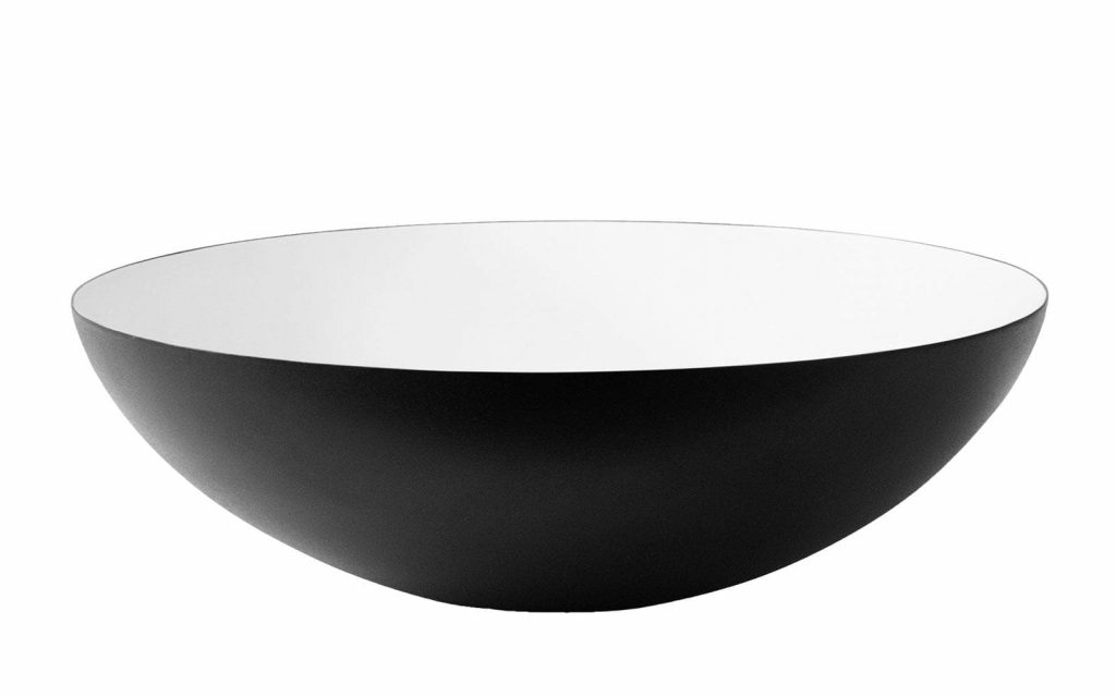 sleek and simple design of the Normann Copenhagen Krenit Bowl, a minimalist household essential that combines aesthetic appeal with practical use.